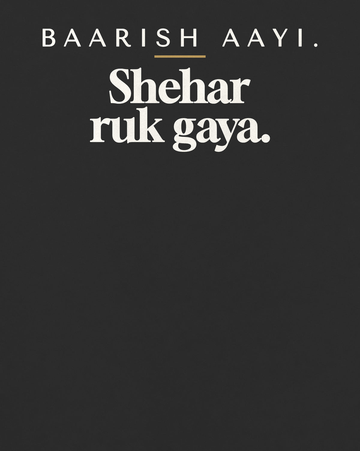 Black oversized t-shirt, close-up of the back print reading Baarish aayi. Shehar ruk gaya – digital mockup