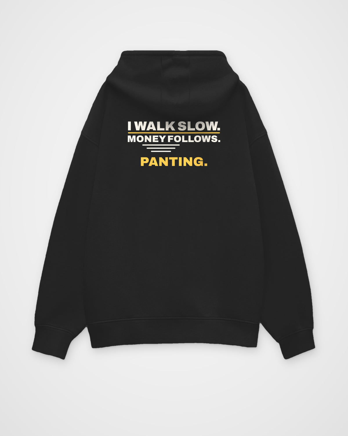 Black oversized hoodie, back view, print reading I walk slow. Money follows. Panting – digital mockup