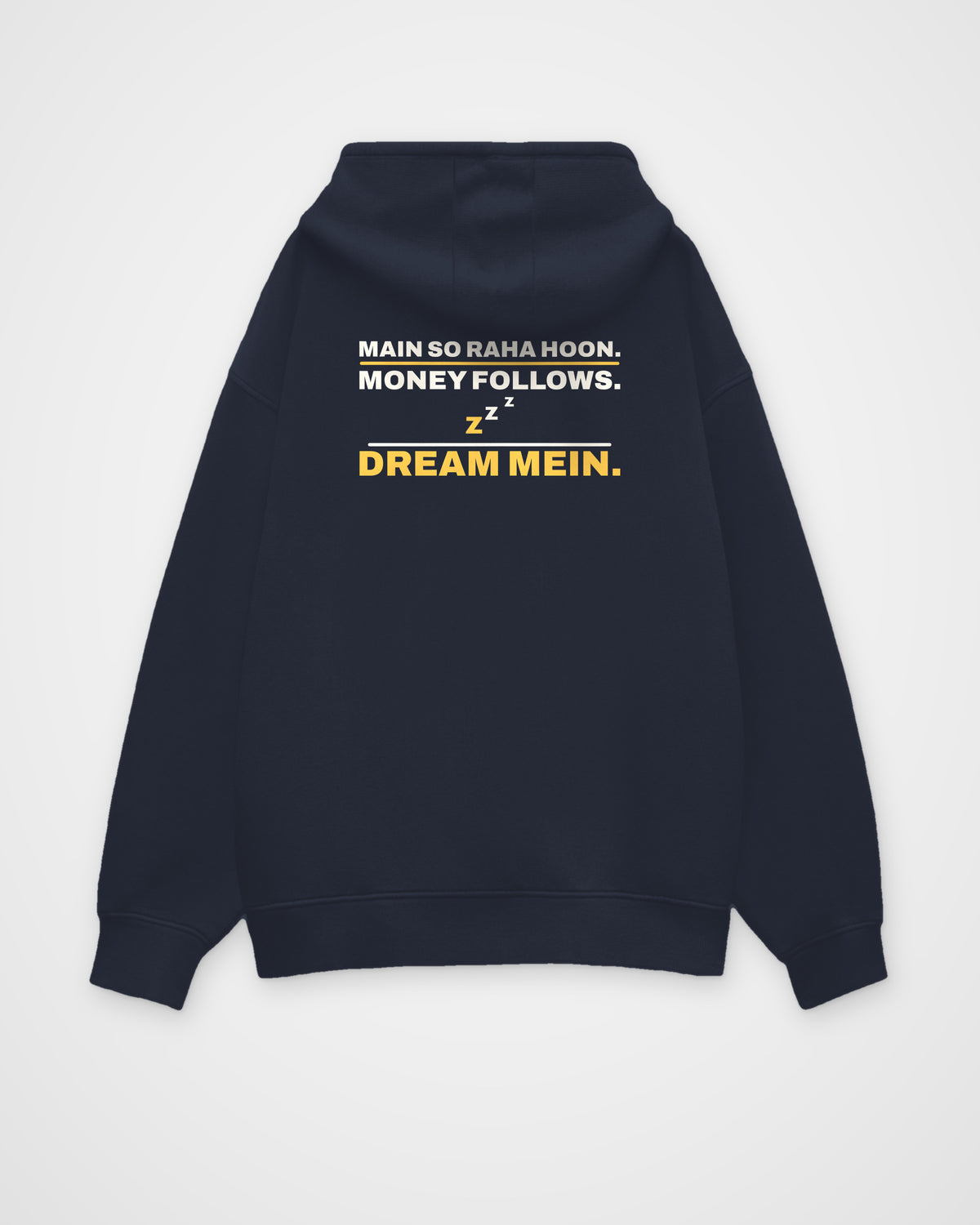 Navy Blue oversized hoodie, back view, print reading Main so raha hoon. Money follows. Dream mein – digital mockup