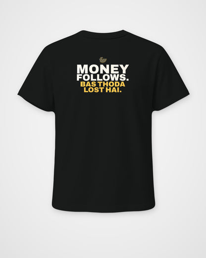 Black regular fit tee, back view, print reading Money follows. Bas thoda lost hai – digital mockup