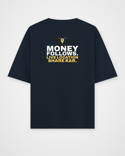 Navy Blue oversized tee, back view, print reading Money follows. Live location share kar – digital mockup