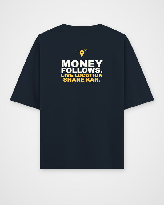 Navy Blue oversized tee, back view, print reading Money follows. Live location share kar – digital mockup