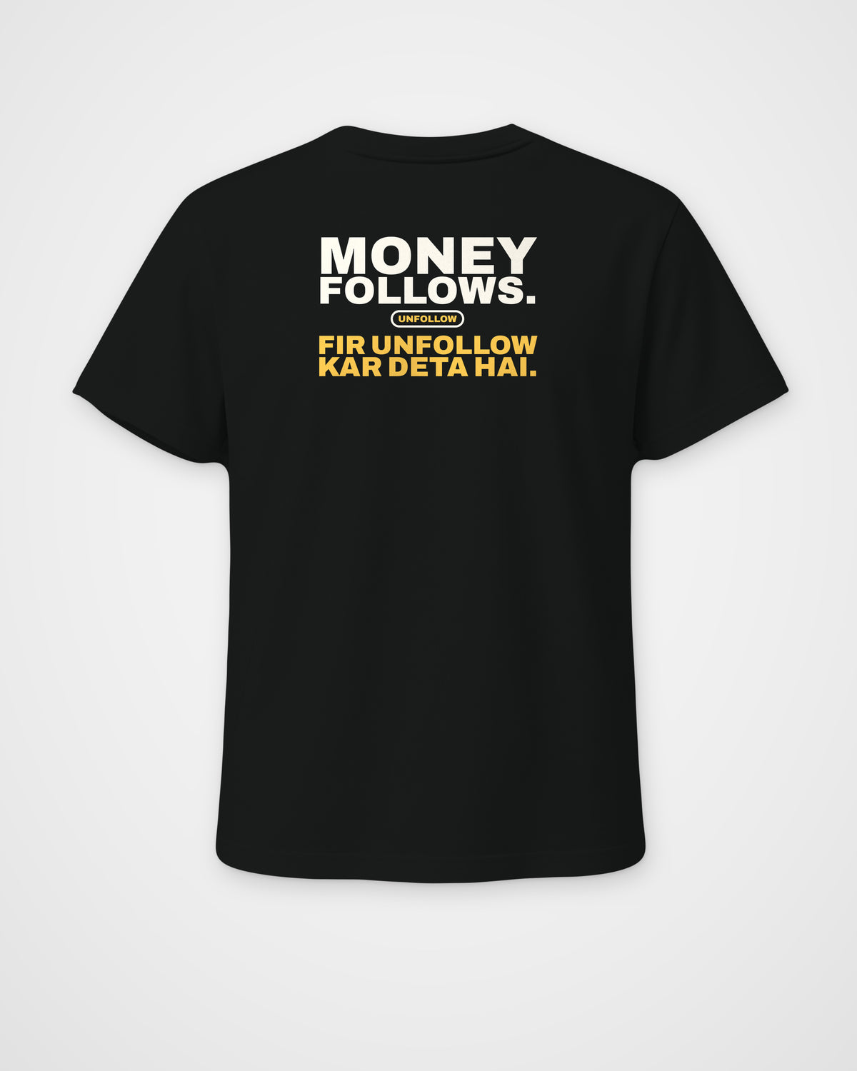 Black regular fit tee, back view, print reading Money follows. Fir unfollow kar deta hai – digital mockup