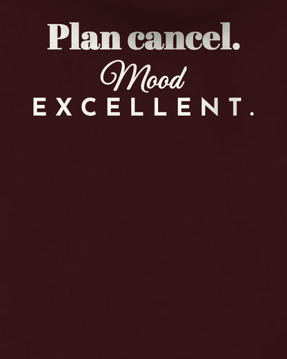 Maroon oversized hoodie, close-up of the back print reading Plan cancel. Mood excellent – digital mockup