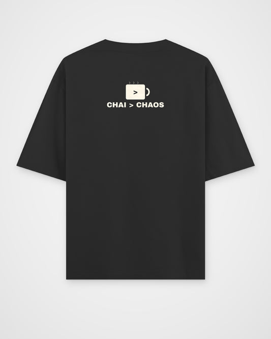 Black oversized t-shirt, back view, a minimal chai cup icon and the line CHAI > CHAOS – digital mockup