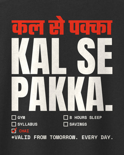 Black oversized t-shirt, close-up of the Kal Se Pakka print