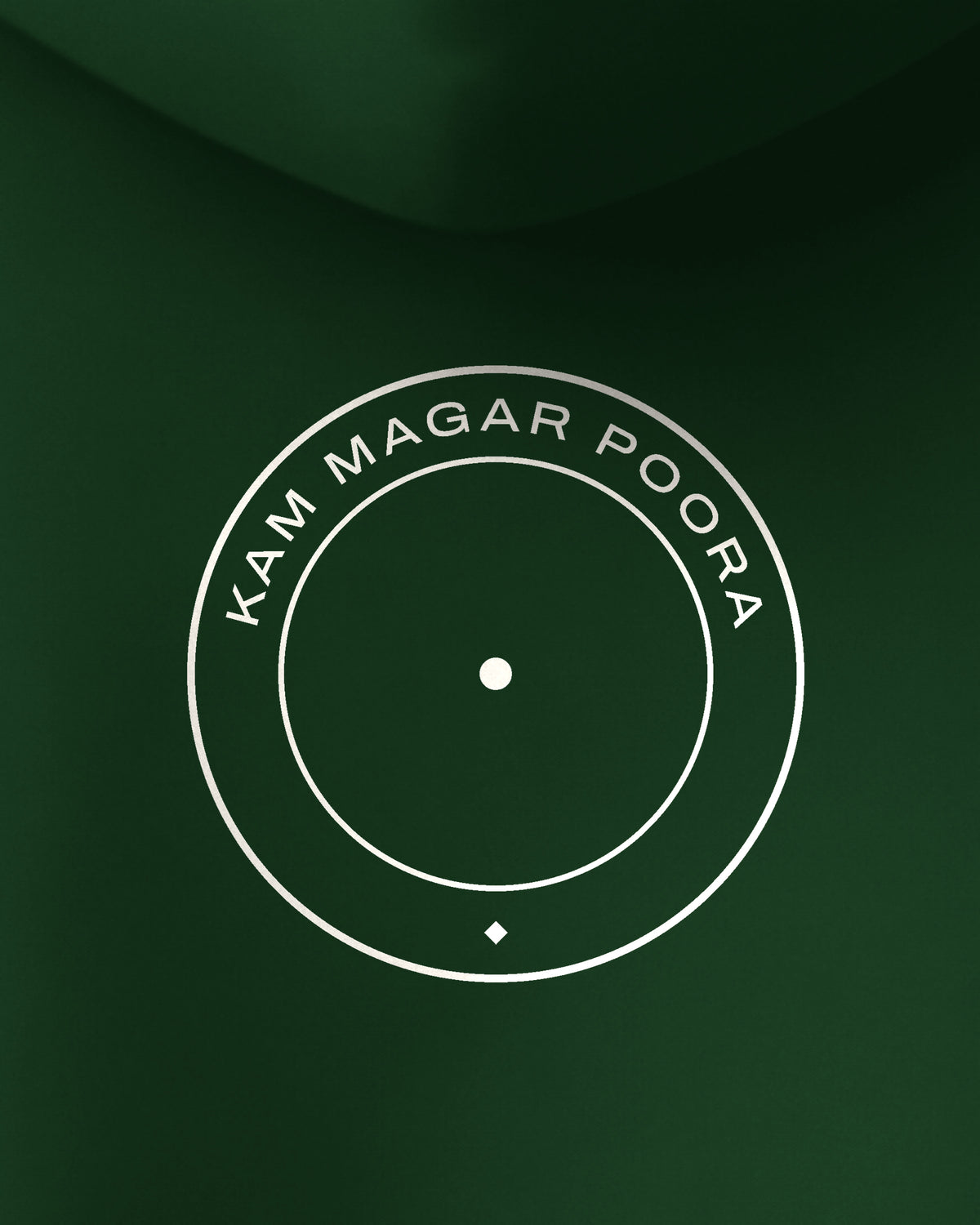 Bottle Green oversized hoodie, close-up of the Kam Magar Poora print