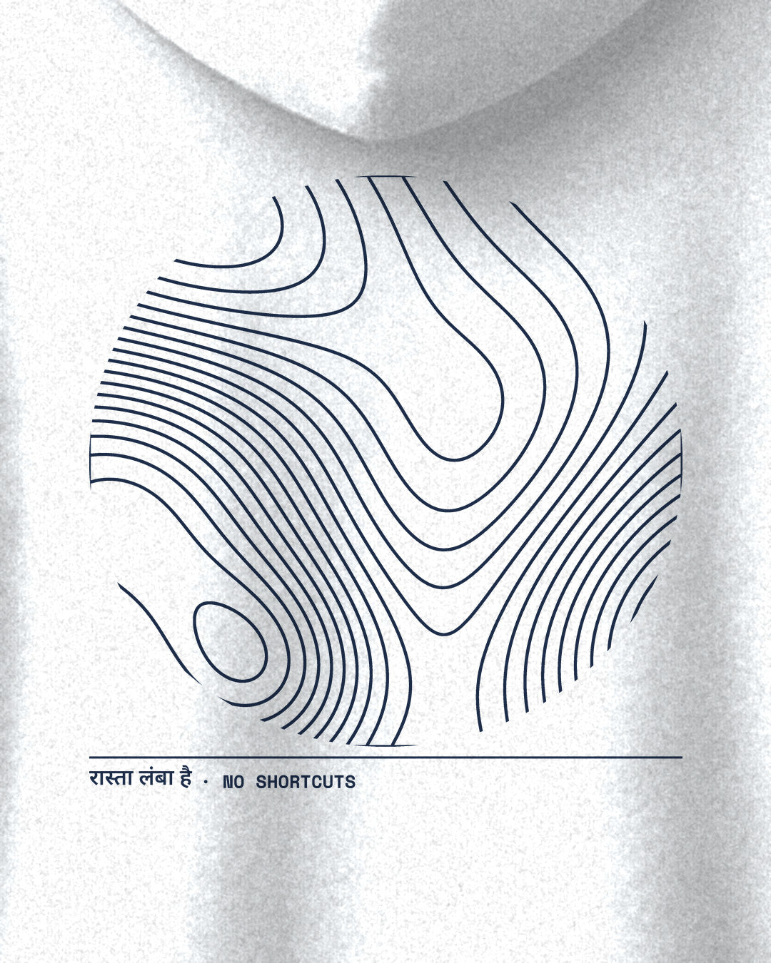 White oversized hoodie, close-up of the No Shortcuts (topographic) print