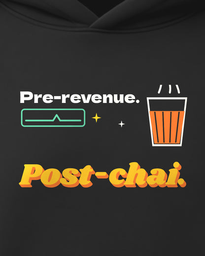 Black oversized hoodie, close-up of the Pre-revenue print