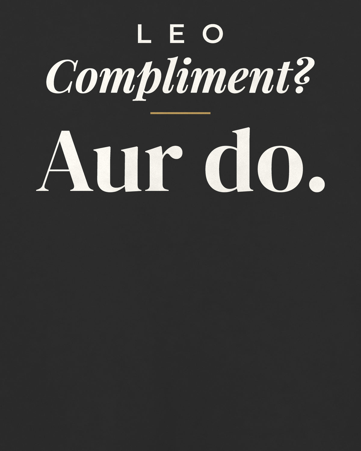 Black oversized t-shirt, close-up of the back print reading Compliment? Aur do – digital mockup