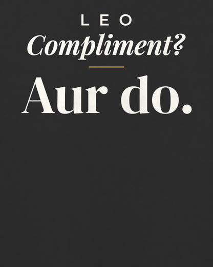 Black oversized t-shirt, close-up of the back print reading Compliment? Aur do – digital mockup