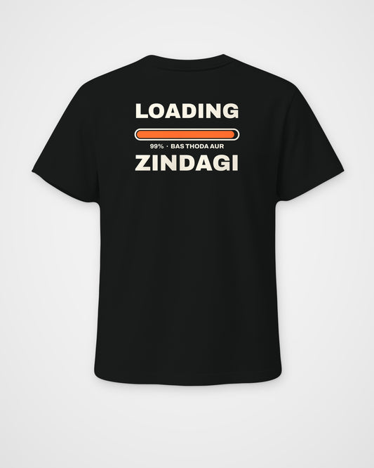 Black regular fit t-shirt, back view, huge stacked LOADING 99% type with an orange progress bar stuck at 99% – digital mockup