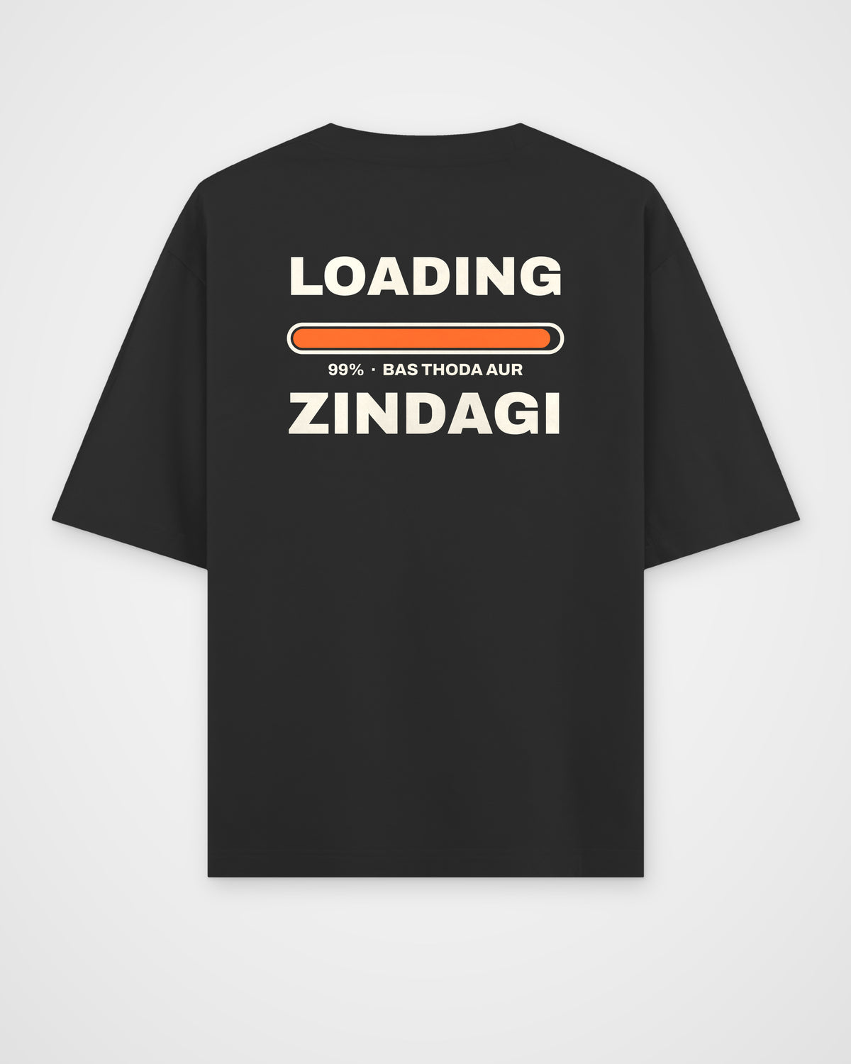 Black oversized t-shirt, back view, huge stacked LOADING 99% type with an orange progress bar stuck at 99% – digital mockup