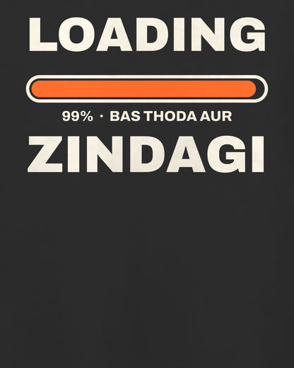Black oversized t-shirt, close-up of the Loading Zindagi 99% back print – digital mockup