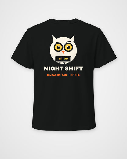 Black regular fit t-shirt, back view, a wide-awake owl holding a laptop at 3:47 AM, NIGHT SHIFT and DIMAAG – digital mockup