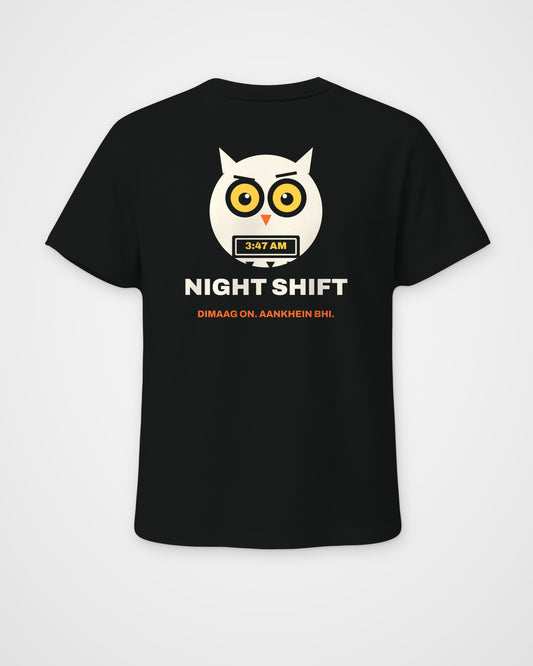 Black regular fit t-shirt, back view, a wide-awake owl holding a laptop at 3:47 AM, NIGHT SHIFT and DIMAAG – digital mockup