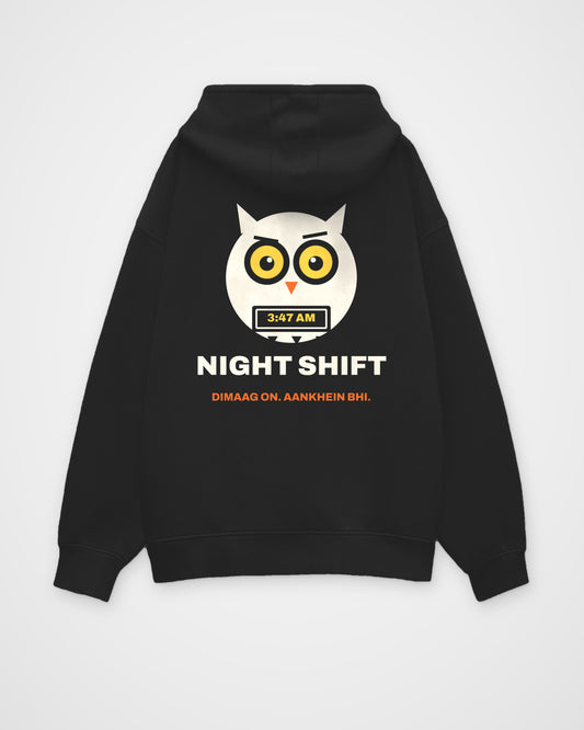 Black oversized hoodie, back view, a wide-awake owl holding a laptop at 3:47 AM, NIGHT SHIFT and DIMAAG ON – digital mockup