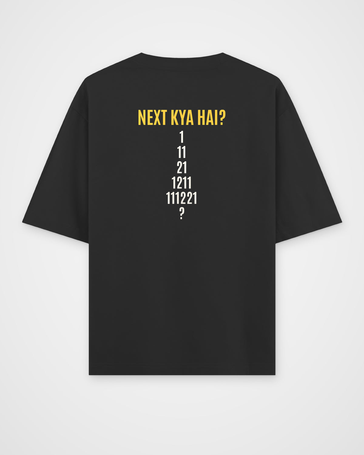 Black oversized t-shirt, back view with one large puzzle print