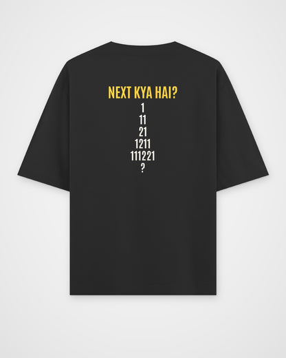 Black oversized t-shirt, back view with one large puzzle print