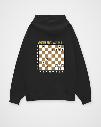 Black oversized hoodie, back view with one large puzzle print