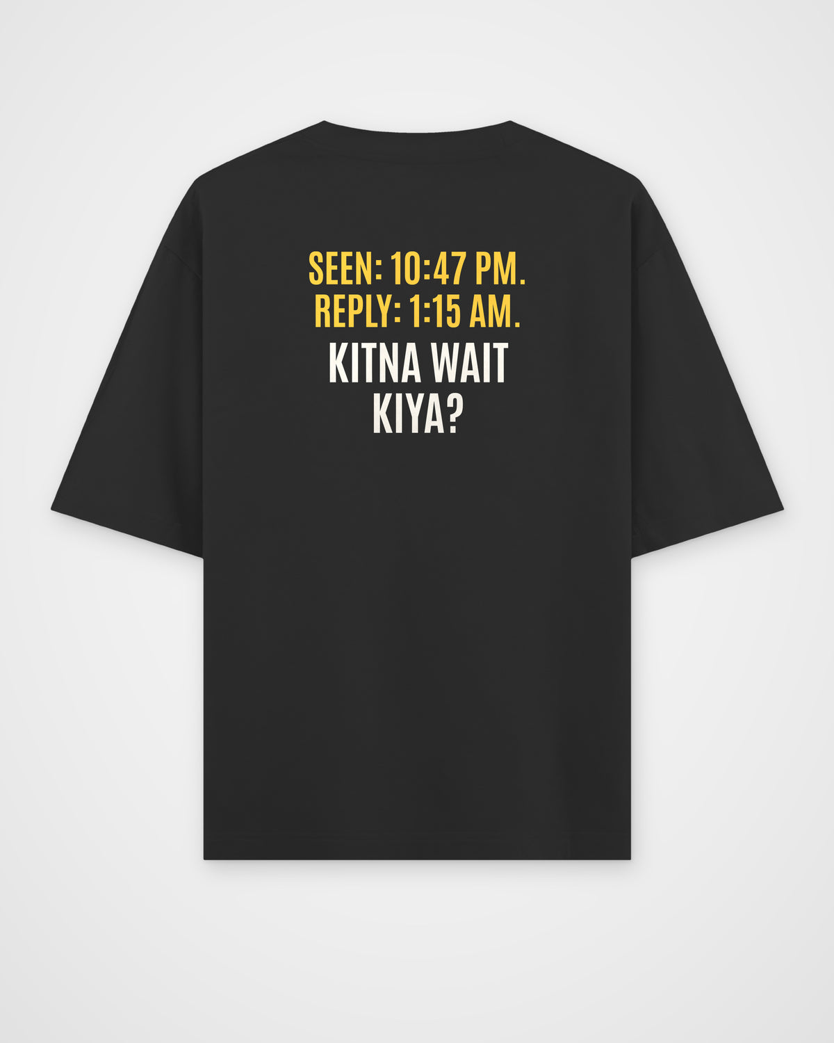 Black oversized t-shirt, back view with one large puzzle print