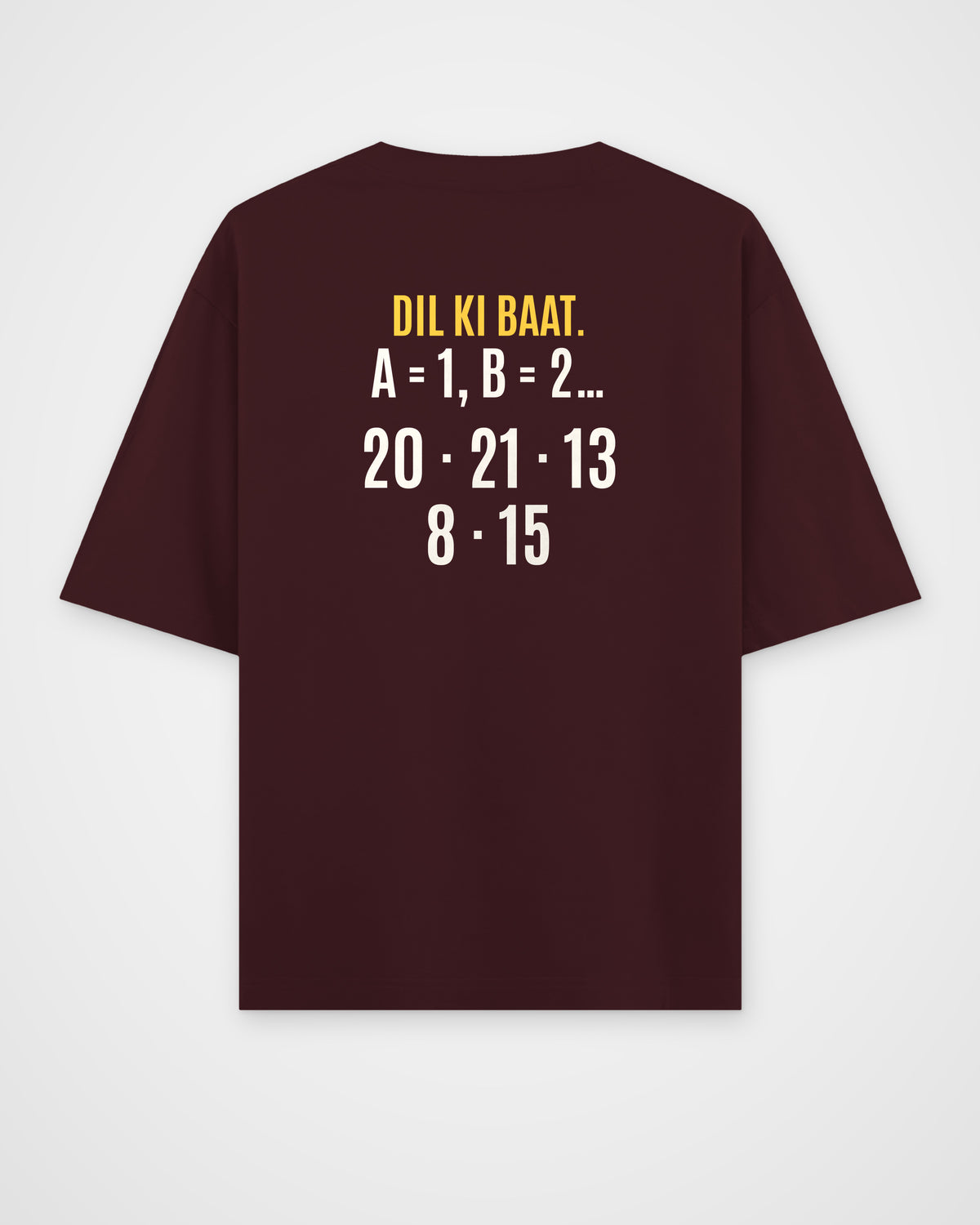Maroon oversized t-shirt, back view with one large puzzle print