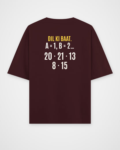 Maroon oversized t-shirt, back view with one large puzzle print