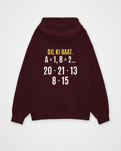 Maroon oversized hoodie, back view with one large puzzle print