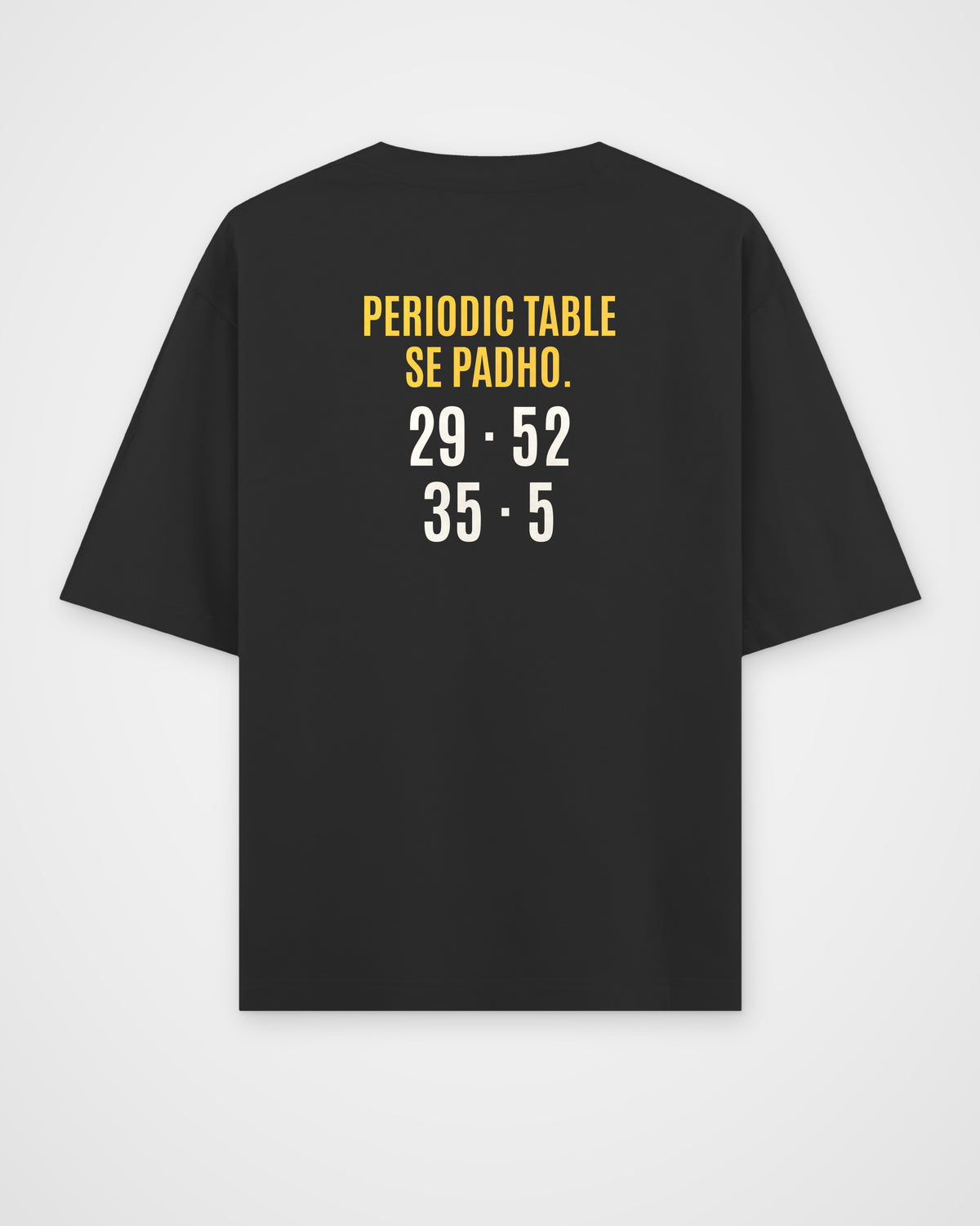 Black oversized t-shirt, back view with one large puzzle print