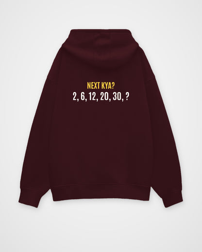Maroon oversized hoodie, back view with one large puzzle print