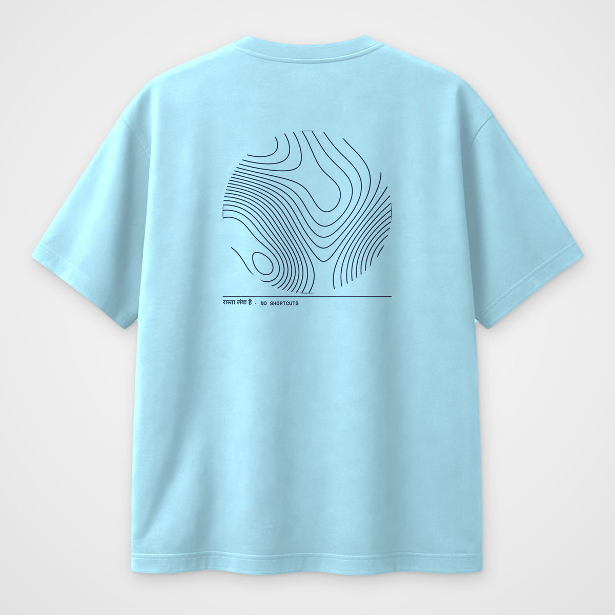 Baby blue oversized t-shirt, back view, with a large navy topographic contour-line print