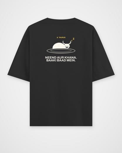 Black oversized t-shirt, back view, with a bull asleep on a plate, TAURUS and Neend aur khana. Baaki baad – digital mockup