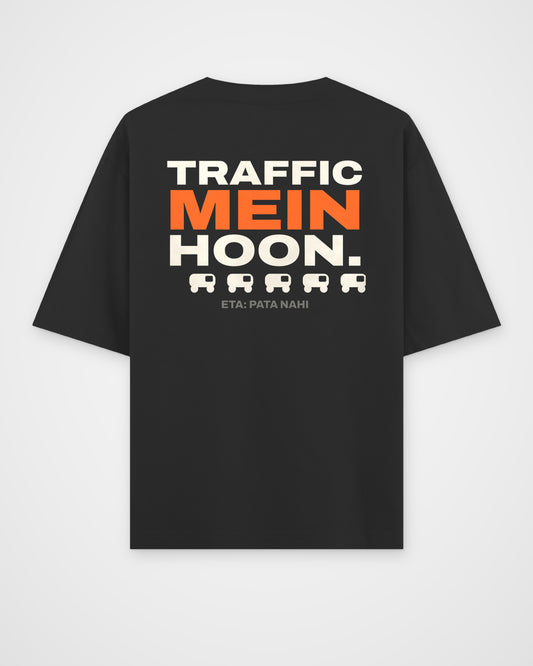 Black oversized t-shirt, back view, full-width stacked TRAFFIC MEIN HOON. type, a rickshaw icon row and – digital mockup