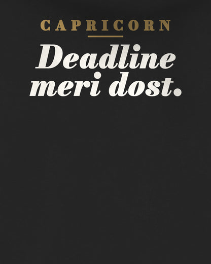 Black oversized hoodie, close-up of the back print reading Capricorn: Deadline meri dost – digital mockup
