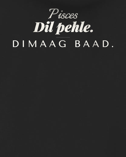 Black oversized hoodie, close-up of the back print reading Pisces: Dil pehle. Dimaag baad – digital mockup