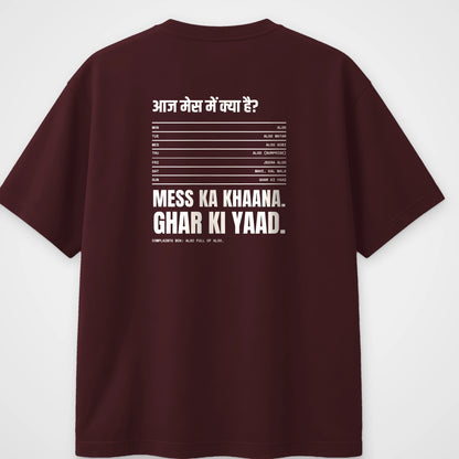 Maroon oversized t-shirt, back view, with a weekly mess menu and the line Mess ka khaana, Ghar ki yaad