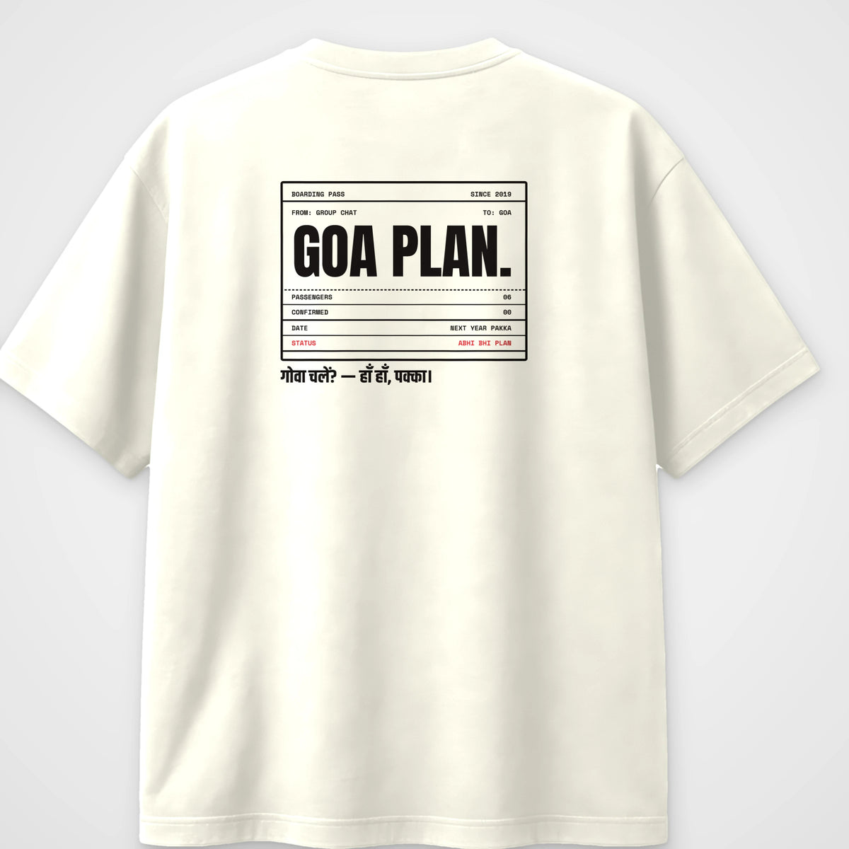Off white oversized t-shirt, back view, with a boarding pass reading Goa plan, status abhi bhi plan